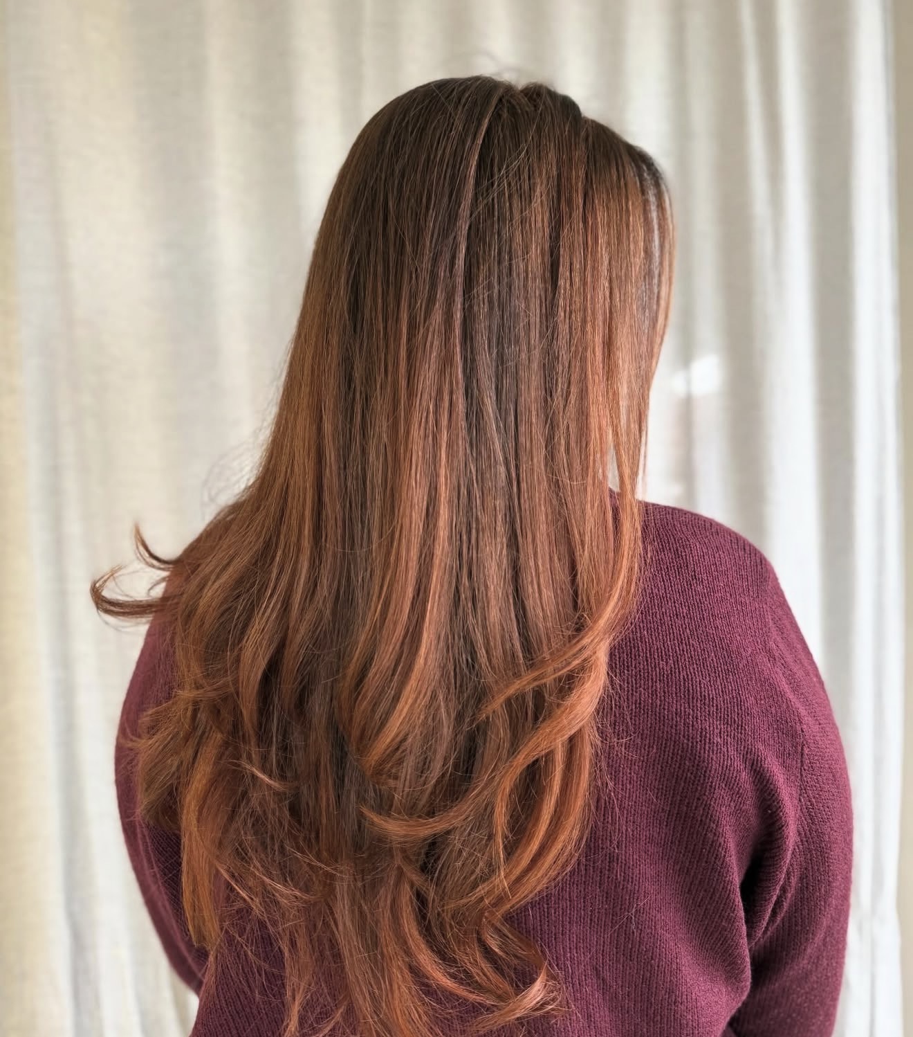 After look met warm koperkleurig haar